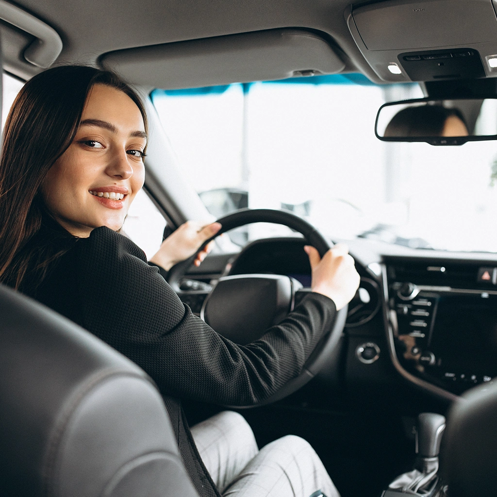 Professional chauffeur driving a luxury vehicle in New Jersey for Cityscape Limo.
